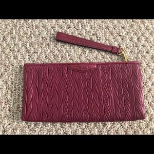 Coach burgundy wristlet